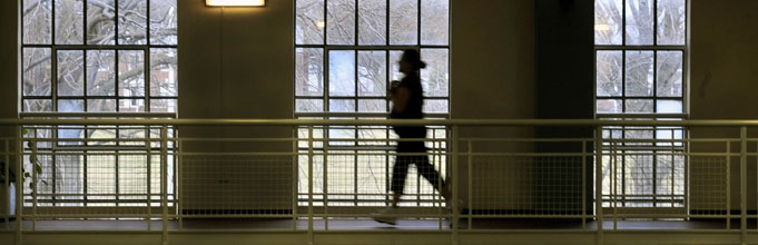 An airman running indoors.